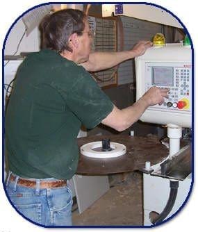 Rodney operating CNC machinery
